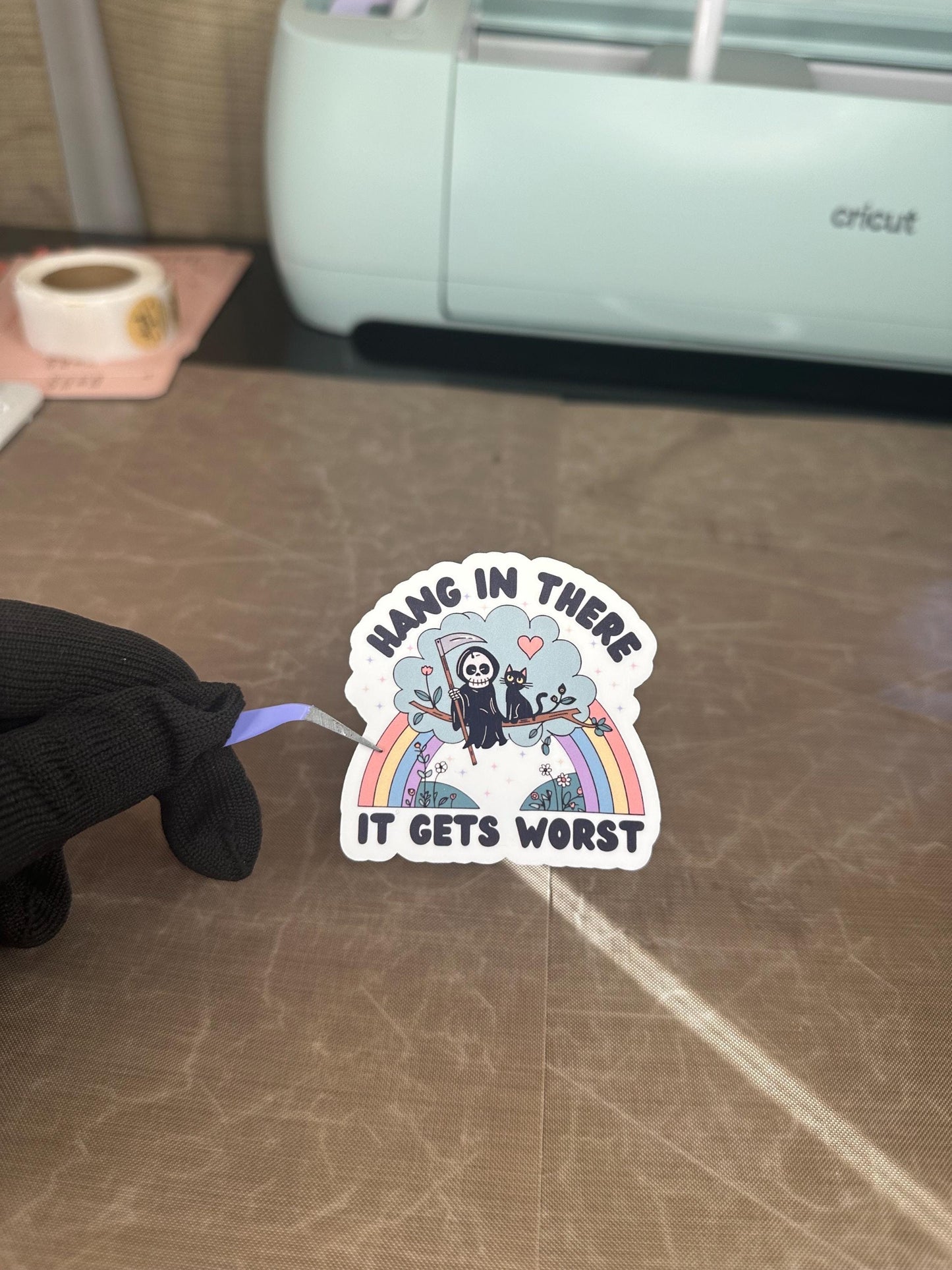 Hang In There It Gets Worse Funny Grumpy Reaper Unicorn Sticker | Dark Humor Gift