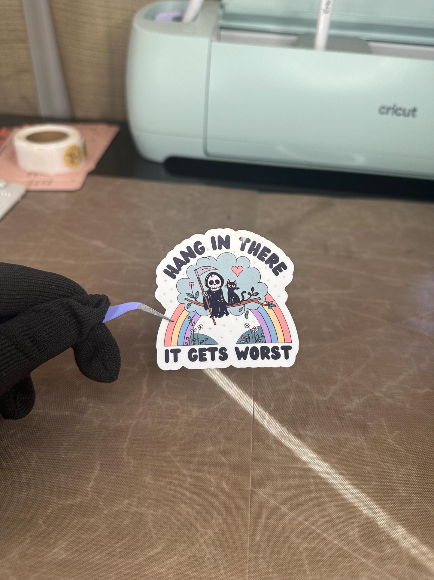 Hang In There It Gets Worse Funny Grumpy Reaper Unicorn Sticker | Dark Humor Gift